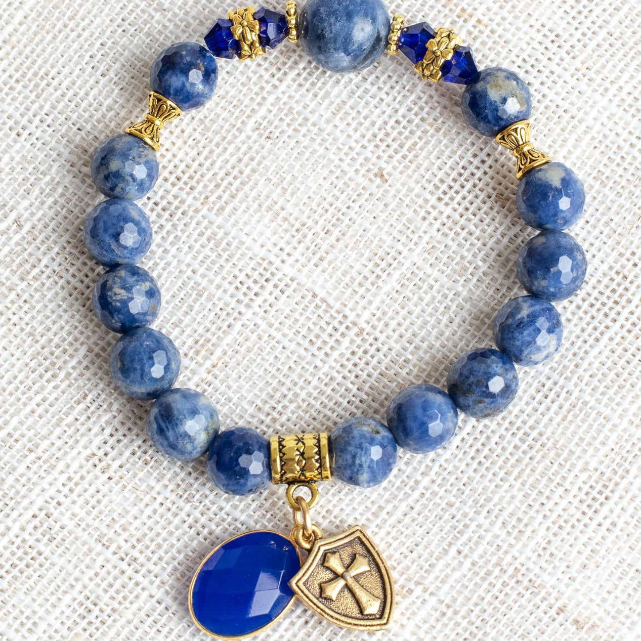 Royal Blue Sodalite Stone Beaded Stretch Bracelet with Bronze Cross Shield and Blue Crystal Charms (Copy)