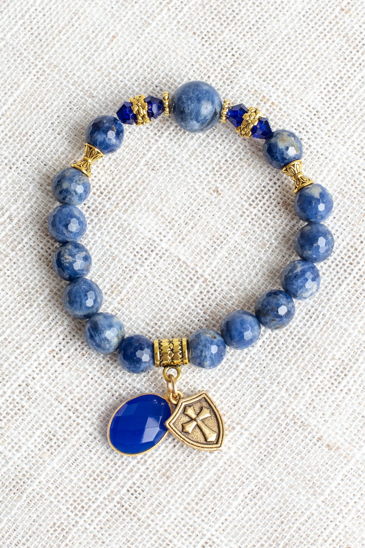 Royal Blue Sodalite Stone Beaded Stretch Bracelet with Bronze Cross Shield and Blue Crystal Charms (Copy)