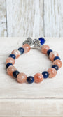 Rust Jasper and Blue Lapis Stone Stretch Bracelet with Silver filigree bail, cross charm and religious charm