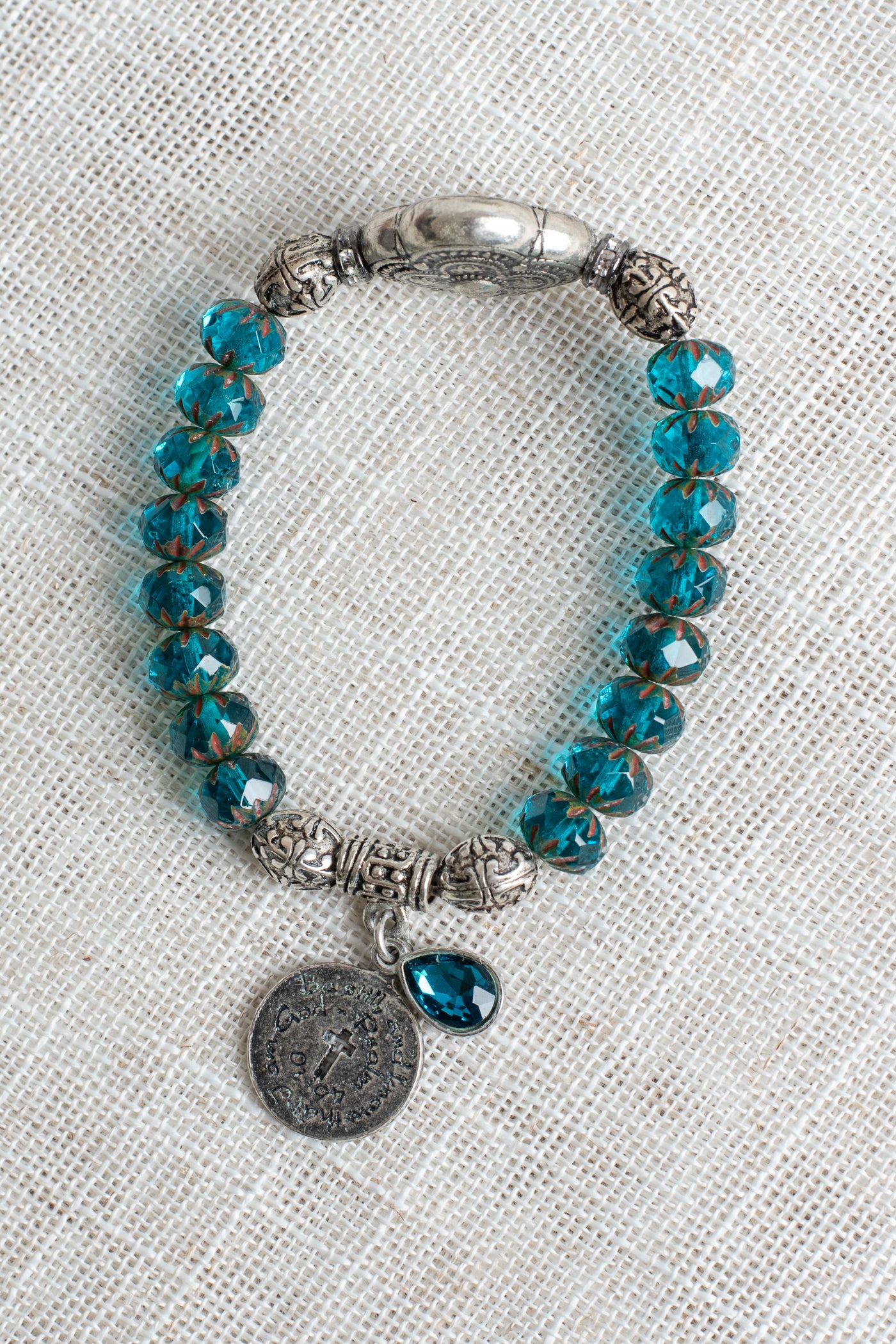 Silver Italian Style Focal Bead and Cross Charm on Turquoise Czech Crystal Rondelle Stretch Bracelet