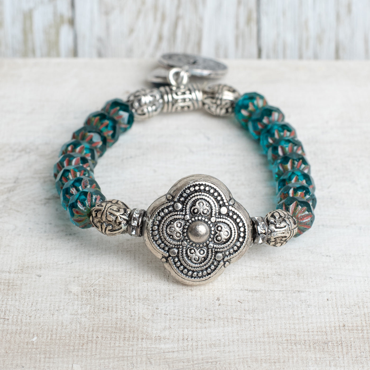 Silver Italian Style Focal Bead and Cross Charm on Turquoise Czech Crystal Rondelle Stretch Bracelet