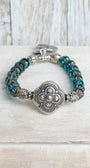Silver Italian Style Focal Bead and Cross Charm on Turquoise Czech Crystal Rondelle Stretch Bracelet