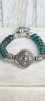 Silver Italian Style Focal Bead and Cross Charm on Turquoise Czech Crystal Rondelle Stretch Bracelet