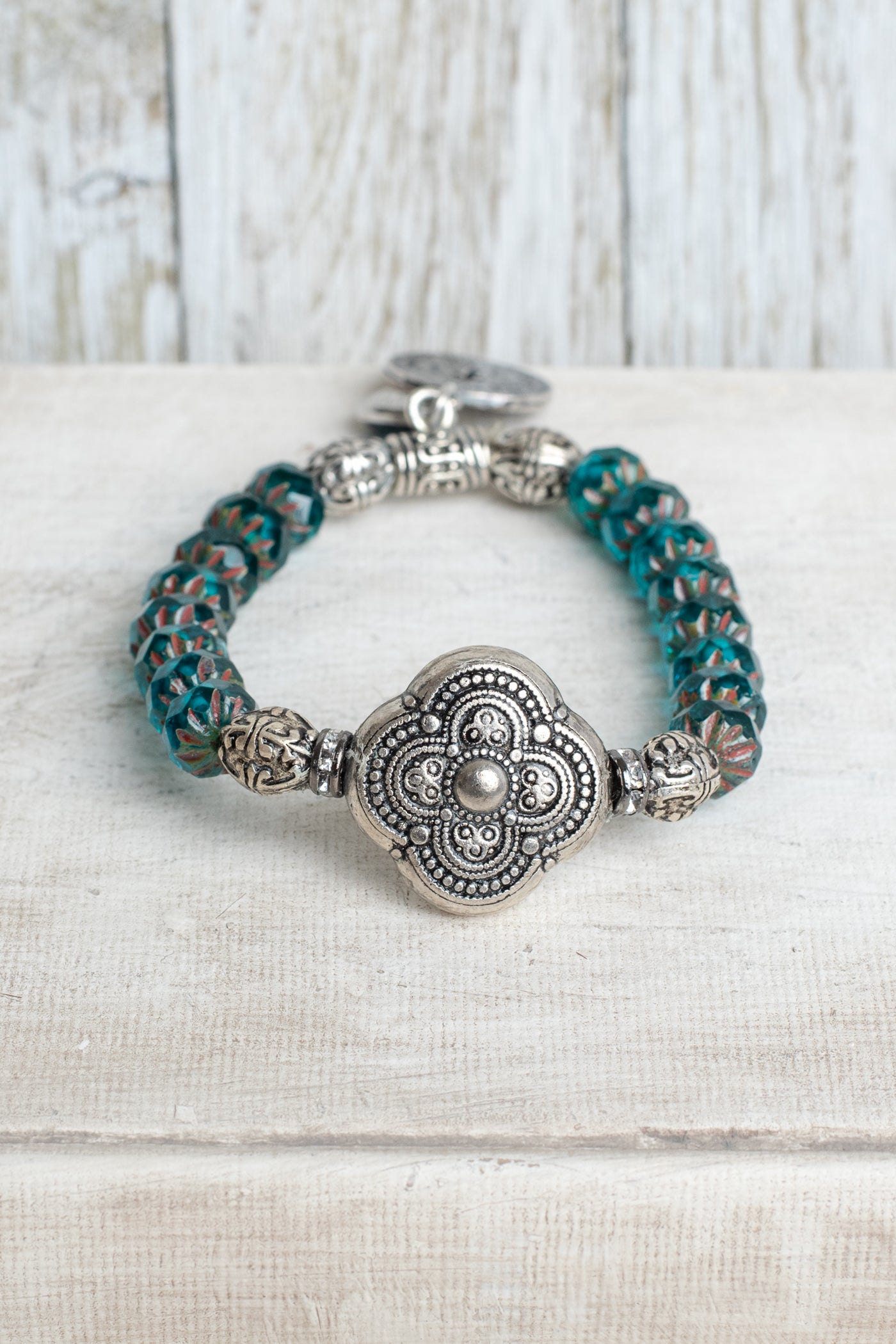 Silver Italian Style Focal Bead and Cross Charm on Turquoise Czech Crystal Rondelle Stretch Bracelet