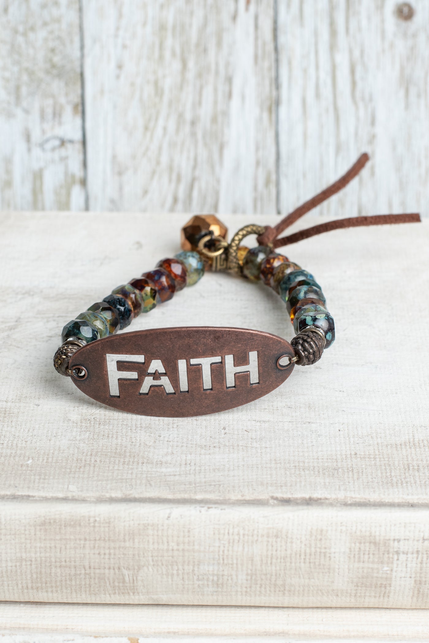 Bronze Oval with FAITH Cut Out on Multi Color Czech Fire Polished Beaded Stretch Bracelet and Leather Tie (Copy)