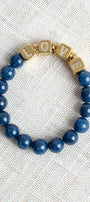 Striking Gold Plated Cube Beads with Pave Crystal Letters Spelling LOVE on Navy Blue Agate Stretch Bracelet