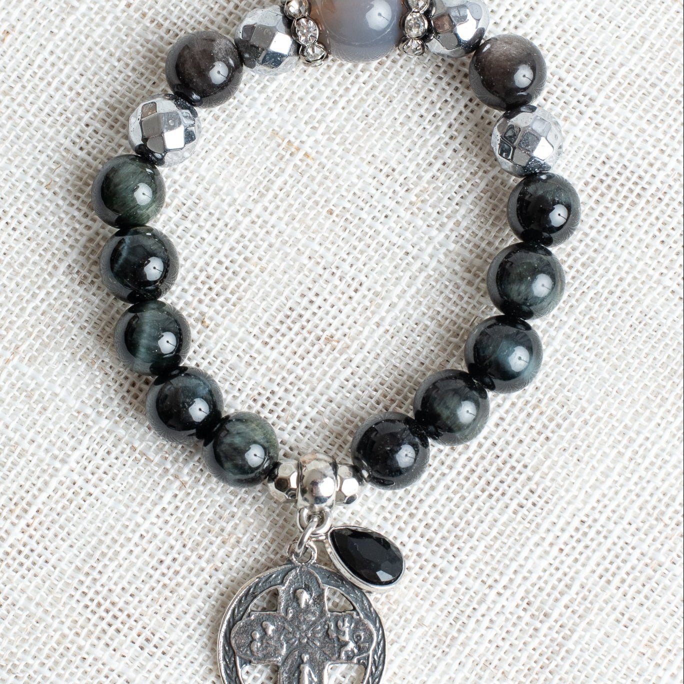 Quartz, Hemitite and Black Silver Swirl Obsidian Stone Stretch Bracelet with Silver Plated Cross Charm and Crystal