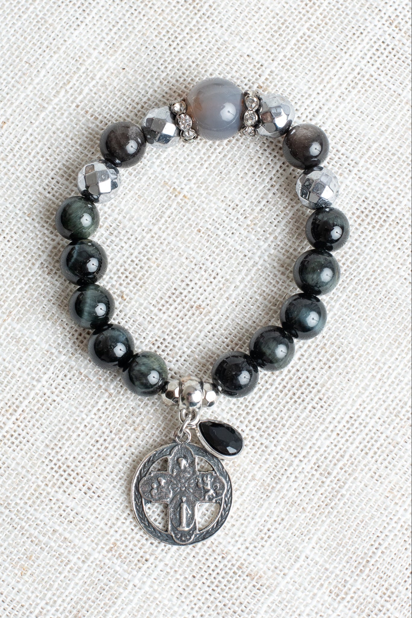 Quartz, Hemitite and Black Silver Swirl Obsidian Stone Stretch Bracelet with Silver Plated Cross Charm and Crystal