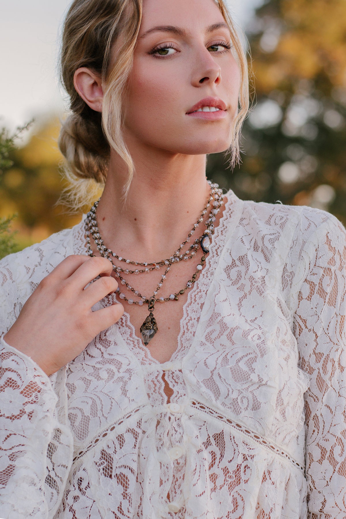 Bronze Vintage Floral and Clear Quartz Pendant on a Light Tan Crystal and Bronze Rosary Chain Necklace