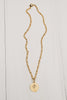 Matte Gold Cross Cutout Disc Necklace