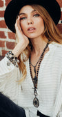 Pavé Black Crystal Cross Pendant on a Faceted Pyrite Beaded Necklace